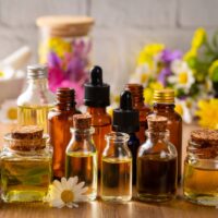 A variety of bottled essential oils.