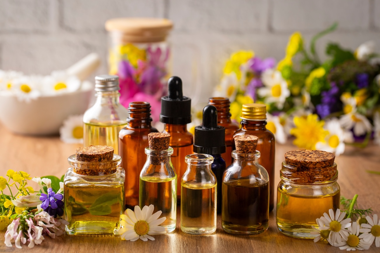 A variety of bottled essential oils.